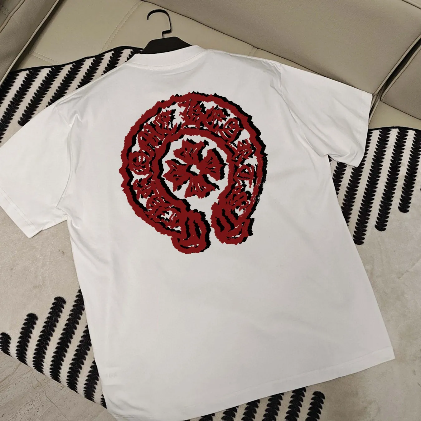 🅿️190 Crow Heart’s new summer T-shirt! This Sanskrit cross printed round neck short sleeves is simply a must-have for fashionistas. Salona cotton fabric is super comfortable, soft and skin-friendly, and has excellent breathability, making it perfect for summer wear. The Sanskrit cross print design on it is amazing, full of mystery and high-end, and the details are so exquisite that it makes people scream. It is worthy of Kroxin, and it vividly interprets the trend and personality. The loose fit is super friendly to all body shapes, covers the flesh and is comfortable, and looks good no matter how you wear it. Pair it with jeans and you'll look cool on the street. Pair it with sweatpants and you'll instantly look energetic and trendy. When you wear it and go out, you will feel like you are the spokesperson of fashion, and it will definitely turn heads. Color: black, white Size: S-2XL